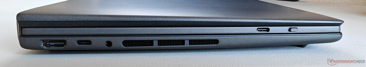 Vänster: HDMI 2.1 FRL, USB-C 4.0 med Thunderbolt 4 (40 GBit/s, DisplayPort, Power Delivery), 3,5 mm ljud, USB-C på tangentbordet (endast för laddning)