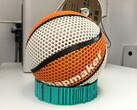 En dekorativ bild som visar en 3D-printad basketboll