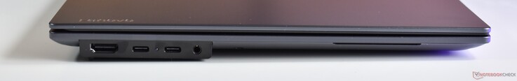 vänster: HDMI, 2x Thunderbolt 4, 3,5 mm ljuduttag