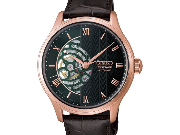 Närbild på den gröna urtavlan på Seiko Presage HCB007, som visar dess strukturerade geometriska mönster