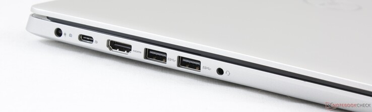 Vänster: AC-adapter, USB 3.1 Typ C Gen. 1 med DP/Power Delivery, HDMI 1.4a, 2x USB 3.1 Gen. 1 Typ A, 3.5 mm kombinerad ljudanslutning