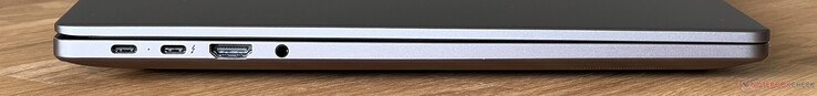 Vänster sida: USB-C 3.2 Gen.1 (5 Gb/s, DisplayPort alt mode, Power Delivery), USB-C 4.0 med Thunderbolt 4 (40 Gb/s, DisplayPort alt mode, Power Delivery), HDMI 2.1, 3,5 mm ljud