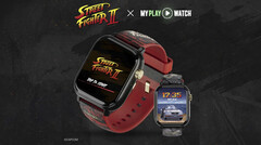 Spelklockan Street Fighter II: My Play Watch med ett rött armband, detaljer med guldfinish och en andra klockdisplay, mot en mörk, texturerad bakgrund.