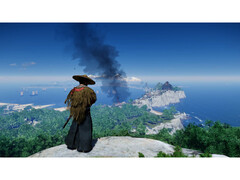 En landskapsbild från Ghost of Tsushima visar Jin som står på ett berg med utsikt över ön. (Bildkälla: Steam)