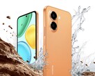 Honor X7e i orange färg med solnedgång