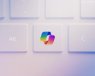 En stiliserad Microsoft Copilot-tangent på en bärbar dator.