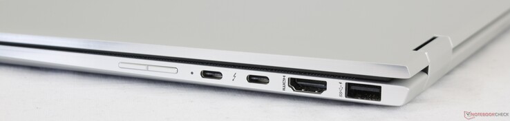 Höger: Volymknapp, 2x USB Typ C med Thunderbolt 3, HDMI 1.4, USB 3.1 Typ A