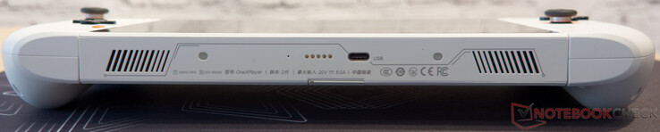 botten: stift för anslutning av tangentbord, USB C 3.2 med strömförsörjning och DisplayPort