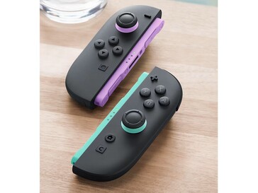 De nya Joy-Cons har ljuslila och ljusgröna accenter på skenorna och joystickarna. (Bildkälla: Nintendo)