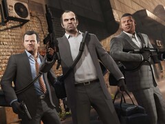 Grand Theft Auto V-huvudpersonerna Michael, Trevor och Franklin i ett rånuppdrag med vapen och väskor. (Bildkälla: Rockstar Games)