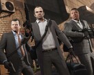 Grand Theft Auto V-huvudpersonerna Michael, Trevor och Franklin i ett rånuppdrag med vapen och väskor. (Bildkälla: Rockstar Games)