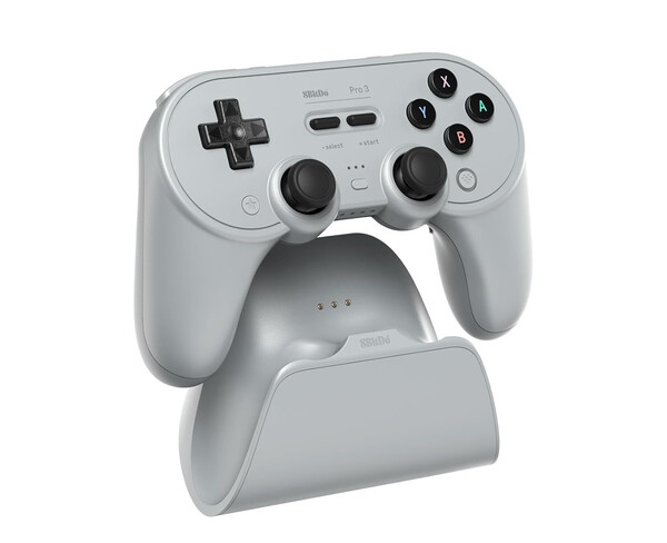 8BitDo Pro 3 levereras med en laddningsdocka som rymmer 2,4 GHz-adaptern. (Bildkälla: 8BitDo)