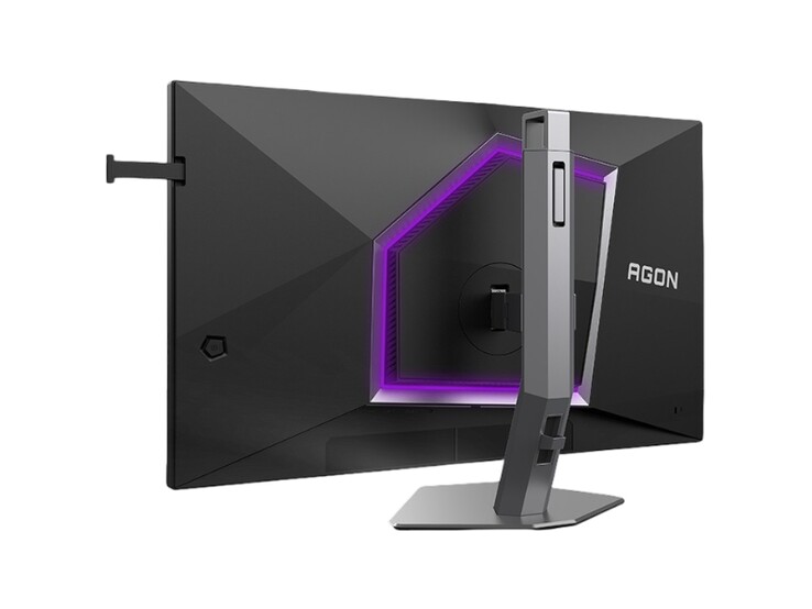 Bilden visar baksidan av spelmonitorn AOC Agon Pro AG276UZ, som har en ganska spelinspirerad design med lila RGB-belysning.