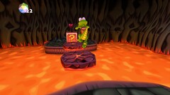 Croc Legend of the Gobbos skärmdump som visar Croc som hoppar över lava