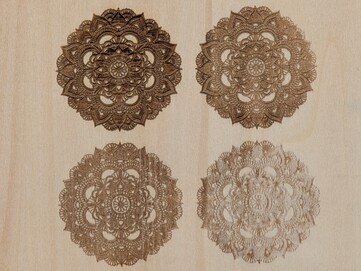 Stock SVG-design i LaserPecker Design Space-programvara på Basswood-ark med olika effekt- och djupvärden med diodlaser.