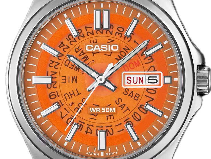 En närbild av den orangefärgade MTP-E740-4AV med sin genomskinliga urtavla som avslöjar dag- och visningshjulen under.