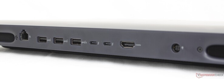 Baksida: RJ-45 (5 Gbps), 3x USB-A 3.2 Gen. 1, 2x Thunderbolt 5 med DisplayPort 2.1 + Power Delivery, HDMI 2.1, AC-adapter