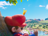 I en lugn stund före det kosmiska äventyret tar Mario en tupplur under ett träd i technicolor - en föraning om lugnet före den interstellära stormen i The Super Mario Galaxy Movie.