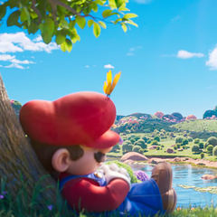 I en lugn stund före det kosmiska äventyret tar Mario en tupplur under ett träd i technicolor - en föraning om lugnet före den interstellära stormen i The Super Mario Galaxy Movie.