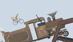 Spelsekvens från Happy Wheels som visar en pappa och ett barn som cyklar mot ett stort lok på en användarskapad hinderbana.