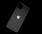 Baksidan av en iPhone med Apple-logotypen på svart bakgrund
