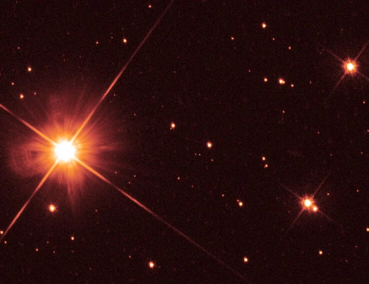 En bild som visar den röda dvärgen Proxima Centauri.