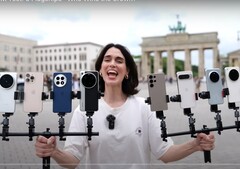 Vivo X200 Ultra krönt till kung av zoomfotografering. En person som håller i testtelefonerna på bilden. (Bildkälla: Versus; beskuren)