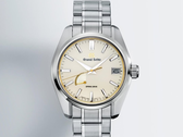 Grand Seiko SBGA519 mot en gradientfärgad bakgrund.