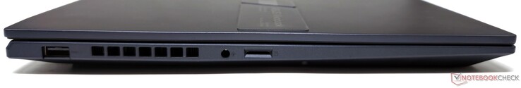 Vänster: USB 3.2 Gen1 Typ-A, 3,5 mm kombinerat ljuduttag, microSD-kortplats