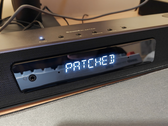 En bild av Creative Katana V2X med texten "Patched" synlig på den.