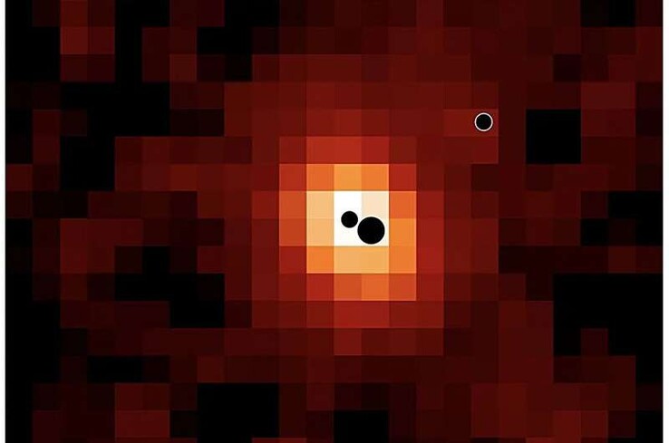 En karta som visar galaxen J0148-4214 och dess tre svarta hål.