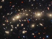 En bild av galaxklustret MACS J0416 tagen med rymdteleskopen James Webb och Hubble (Bildkälla: NASA, ESA, CSA, STScI)