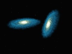En konstnärs illustration som visar två galaxer.