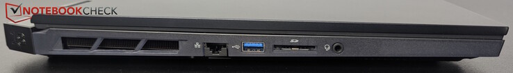Vänster: LAN, USB-A (10 Gbps), SD-läsare, headset