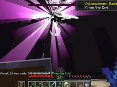 En skärmdump av en användare som besegrar Ender Dragon i Minecraft