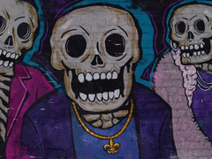Graffiti som avbildar Saints Row-gänget