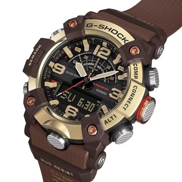 Vinkelbild av G-Shock Mudmaster GG-B100XMH-5A som visar dess digital-analoga display och ljusgula och bruna färgskala.