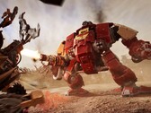 En Blood Raven Space Marine Dreadnought avfyrar sitt vapen mot Ork-enheter i Warhammer 40,000: Dawn of War IV:s in-engine trailer. (Bildkälla: Warhammer via YouTube)