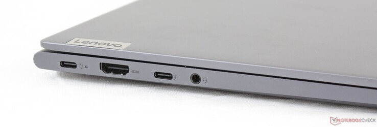 Vänster: USB Typ C med DisplayPort, HDMI, USB Typ C + DisplayPort, 3.5 mm kombinerad ljudanslutning (Här visas Intel-versionen.  AMD-versionen saknar Thunderbolt 3-loggan bredvid USB C-porten)