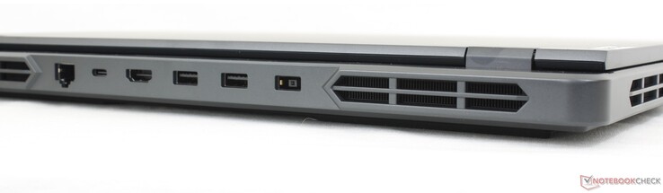 Baksida: 1 Gbps RJ-45, USB-C 3.2 Gen. 2 med PD (140 W) + DisplayPort 1.4, HDMI 2.1, 2x USB-A 3.2 Gen. 1, AC-adapter
