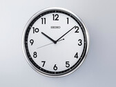 Seiko KX701S retro kvarts-väggklocka med silverfärgad ram och kontrasterande svartvit urtavla.