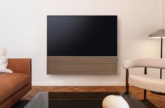 Samsung kombinerar S99H OLED Smart TV med en elegant soundbar med frontpanel i trä.