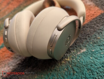 Höger sida: Volym och play/paus