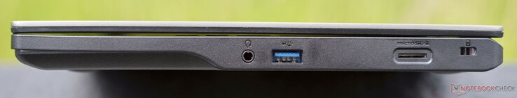 Höger: Ljuduttag, USB-A 3.2 Gen1 (5 GBit/s), microSD-kortläsare, Kensingtonlås