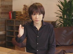 Nintendos spelskapare Masahiro Sakurai sitter vid ett bord (Bildkälla: The Guardian)